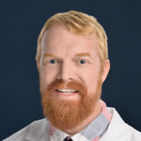 Adam G Benham